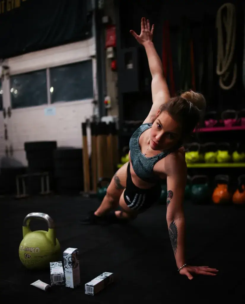 The Ultimate Shoulder Workout woman exercising in gym